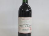 a bottle of wine that is sitting on a table
