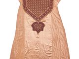 an old dress with a design on the front of it