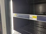 a refrigerator that has a lot of food inside of it