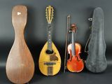 four different types of musical instruments are lined up against a black background
