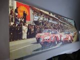 a picture of a picture of a group of cars on display