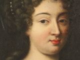 portrait of a woman in a white dress with a red rose in her hair