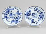 pair of chinese blue and white plates on stands