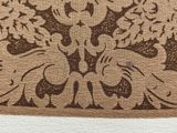 a picture of a brown and white towel with a picture of mickey mouse and pluto pluto pluto pluto