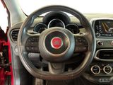 the interior of a car with a steering wheel and dashboard controls