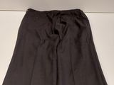 a close up of a pair of black pants on a white shelf