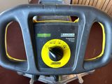 a close up of a black and yellow machine
