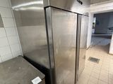 an image of a commercial kitchen with stainless steel appliances