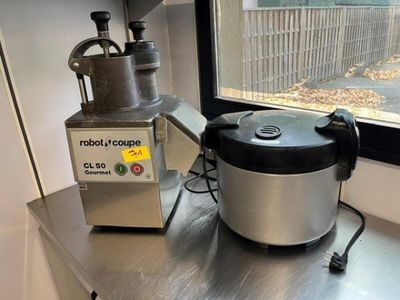 a machine that is sitting on a counter next to a window