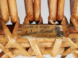 a close up of a wooden chair with a label on it