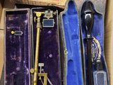 a box with a key and other items inside of it