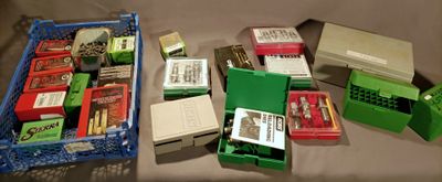 many different boxes of cigarettes and cigarettes on a table