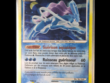 a picture of a pokemon card with a picture of a blue and white pokemon