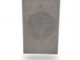 an image of a speaker on a white surface with a white background