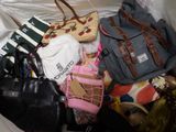many bags and purses that are in a bag