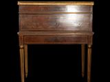 an old wooden desk with a drawer on top of it