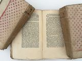 two old books sitting on top of each other