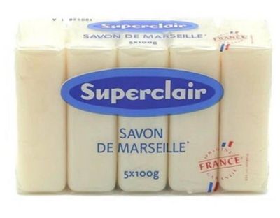 soap bars of soap with a blue label on top of them