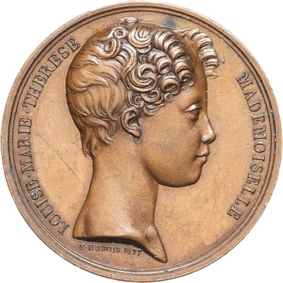 an old bronze medal with a woman ' s head on it ' s side