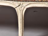 an upholstered upholstered chair with a floral upholstered seat