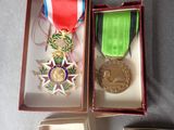 a small box with a medal and a medal on it