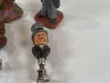 three figurines that are sitting on a table