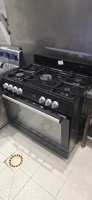 UN Piano Gaz 5 Feux Avec Four Beko Dimension 90 X 68 X 96 CM…