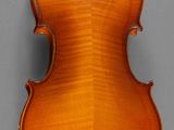 an old violin with a wooden back and a long neck