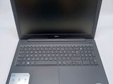 the dell laptop is open and ready to be used