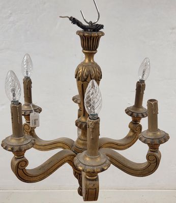an image of a chandelier with three lights on each of it