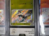 a lot of pokemon cards on display on a table