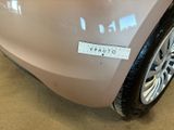 a close up of a car with a sticker on it ' s bumper