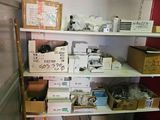 many boxes and boxes on the shelves in the room
