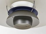 a light that is hanging from the ceiling in the room
