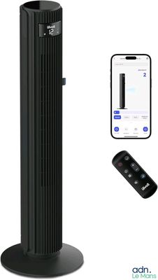 une photo d'un purificateur d'air en forme de tour noire à côté d'un téléphone portable