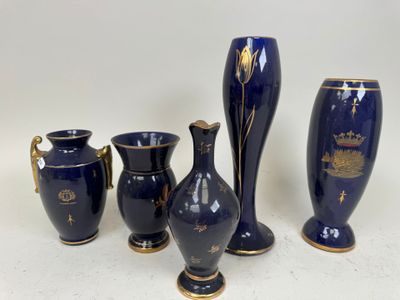 four vases that are sitting next to each other on a table
