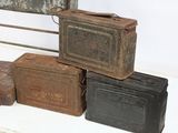 three old suitcases stacked on top of each other on a table