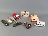 a lot of toy vehicles that are on the table