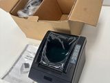 a box with a computer inside of it on a table