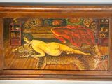 a painting of a naked woman laying on a rug