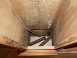 a picture of a wooden floor with a hole in it