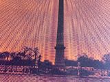 a picture of a picture of a tower in the sky