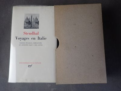 un livre ouvert sur lequel figure l'image d'une ville