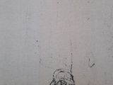 a drawing of a cat sitting on top of a table next to a wall