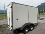 a trailer that is parked in the parking lot