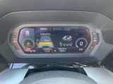 a digital display on the dashboard of a car
