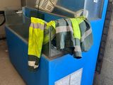 an image of a blue box with a yellow jacket on it