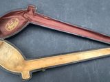 a wooden spoon and a wooden spoon in a case