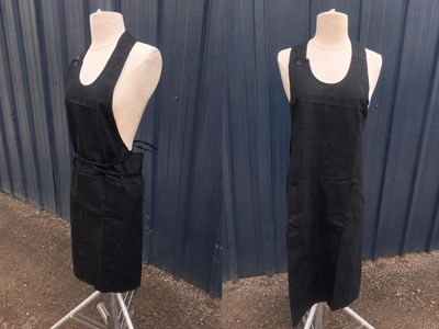 two mannequins that are standing on a stand