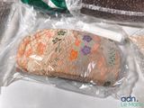 a piece of bread wrapped in plastic on a table